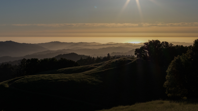 Mountain Sunset - Golden hour over horizon